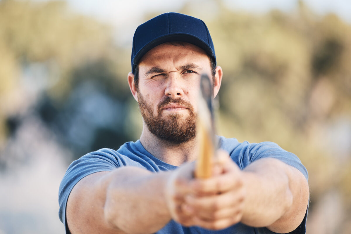 man preparing for an axe throwing event